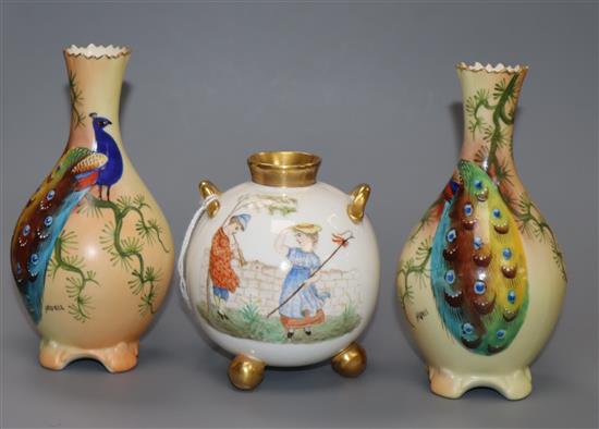 A pair of Royal Worcester blush vases and a figurative vase